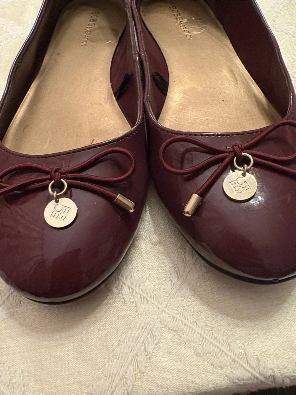 BCBGeneration Women's Burgundy Bow Ballet Flats